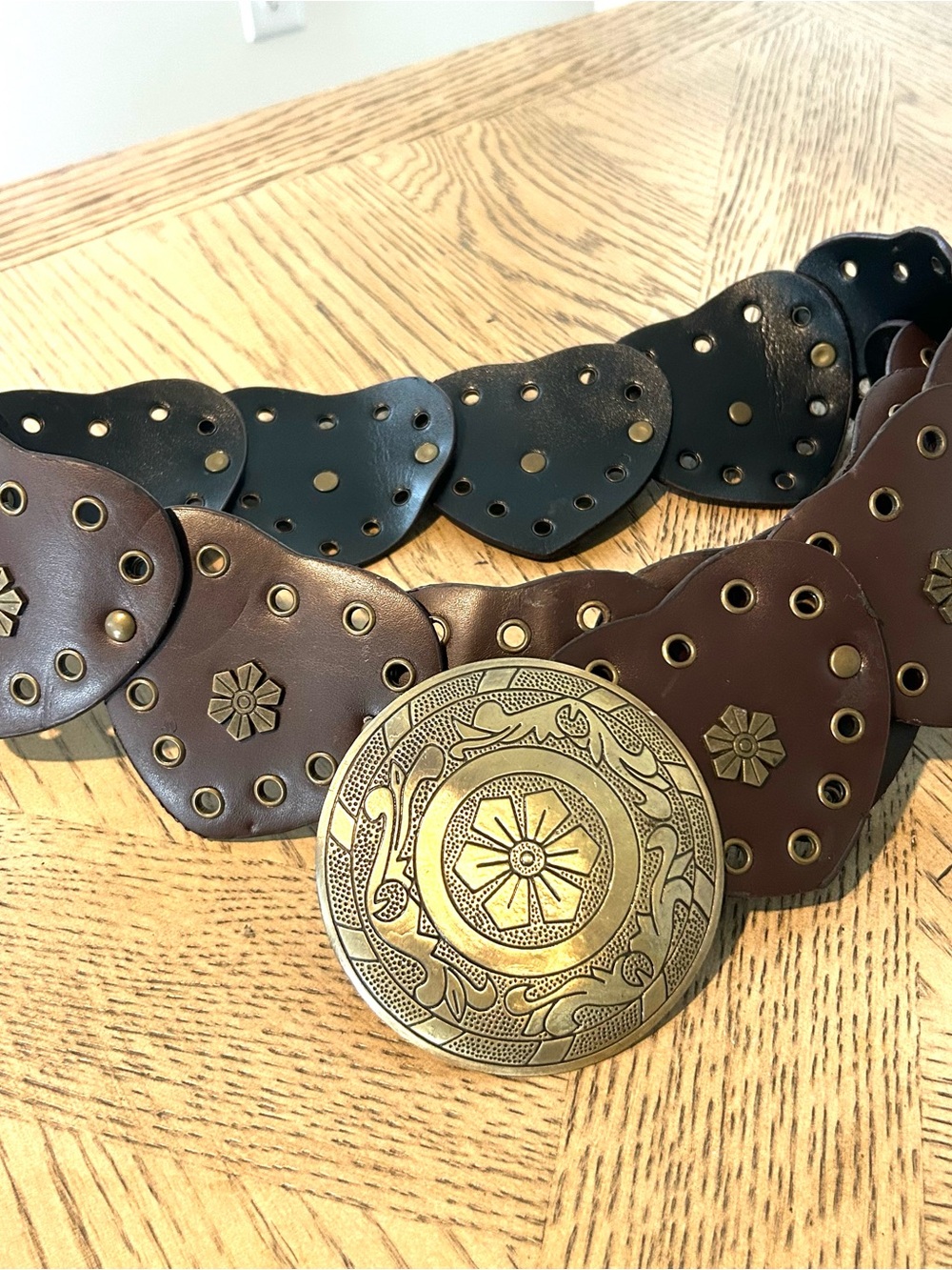 Vintage-Inspired Brown Leather Belt with Decorative Brass Medallion